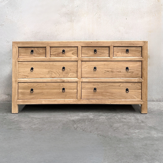 Linear 8 Drawer Chest Cabinet, Natural, 160 cm, front view against a plaster wall