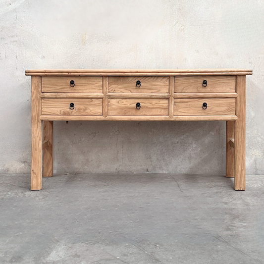 Heritage 6 Drawer Console, Natural, 160 cm, front view against a plaster wall