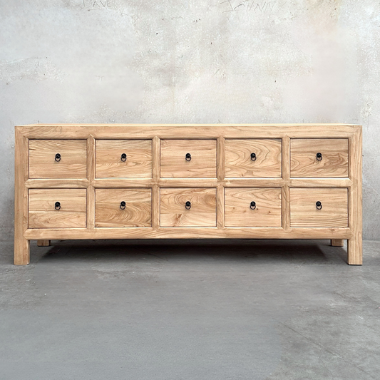 Linear 10 Drawer Cabinet, Natural, 210 cm, front view against a plaster wall